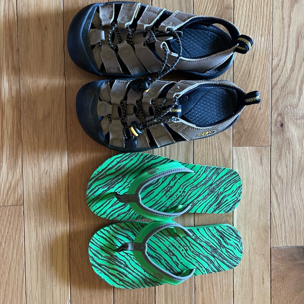 Size 1. Lightly used Keen sandals, brand new pair of North Face flip flops.
